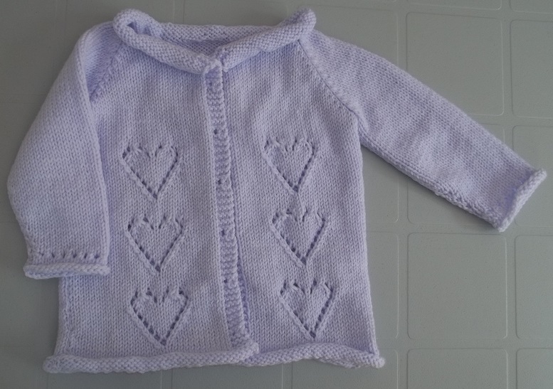 Veste pour bébé fait par Aline